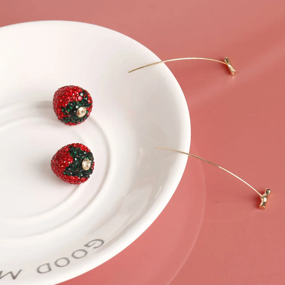 Zinc alloy strawberry-shaped drop earrings with spot drill detail in red, pink, purple, and champagne colours.