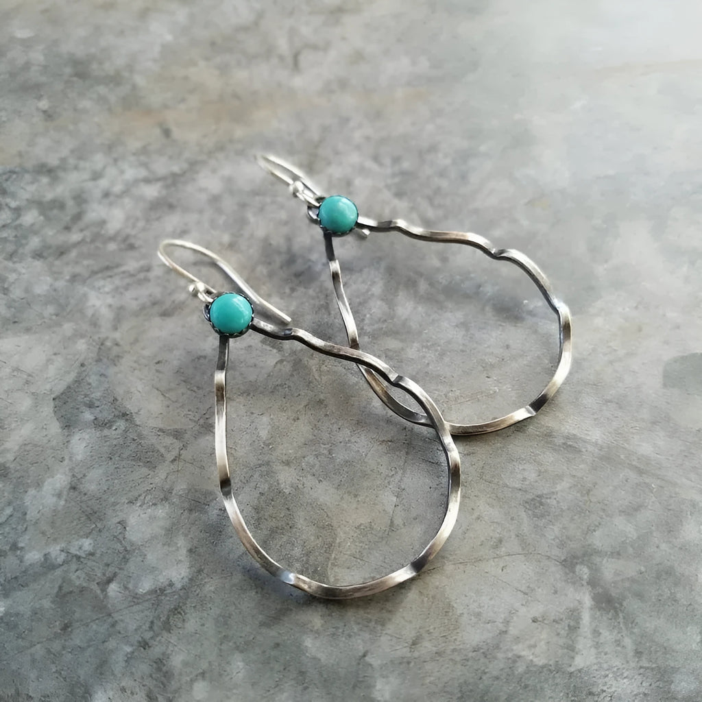 Circular bohemian style earrings with geometric design in antique silver finish