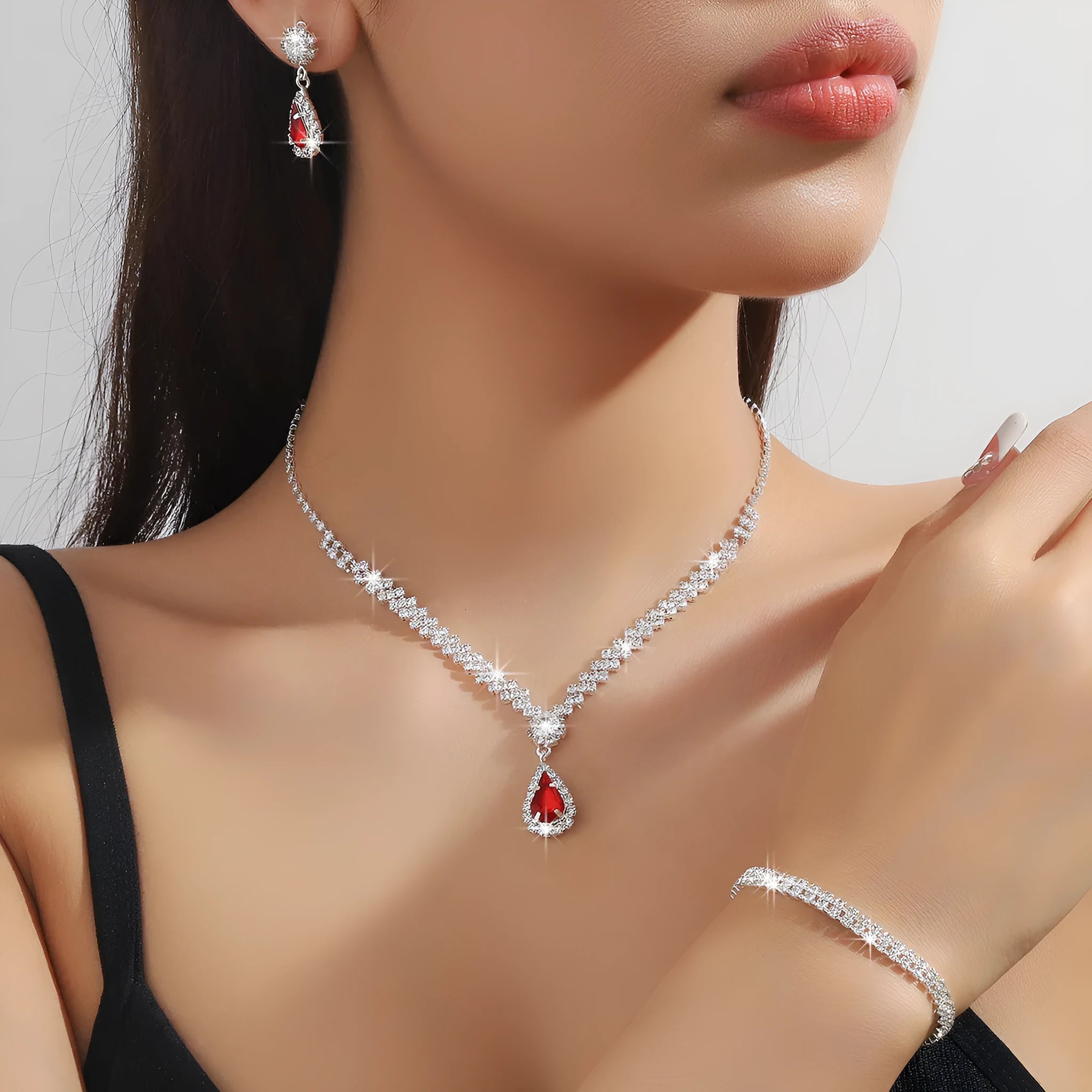 Rhinestone claw chain necklace and matching water drop earrings set in selected colour