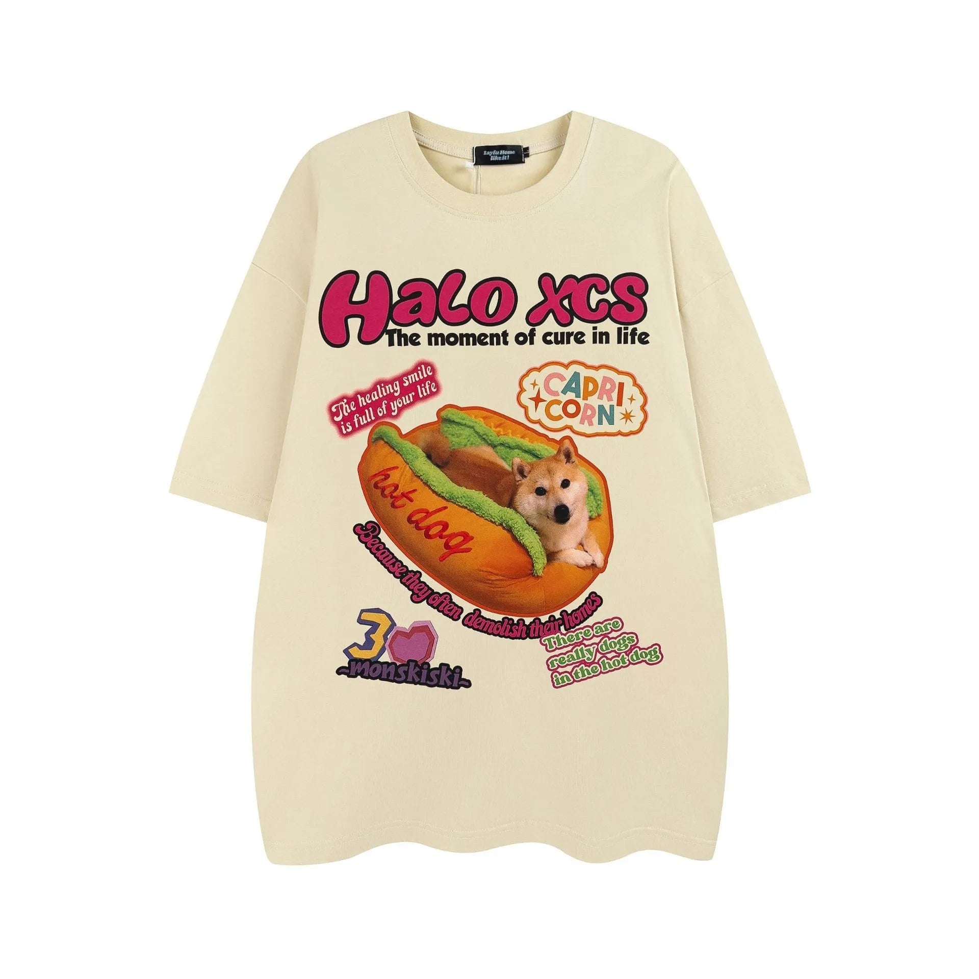 White cotton t-shirt with a cartoon print of a hamburger and a dog, showing a round neck and short sleeves.