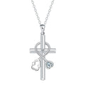 Copper cross necklace with a detailed stethoscope pendant on a chain.