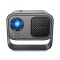 Black portable HD smart projector with remote control on table