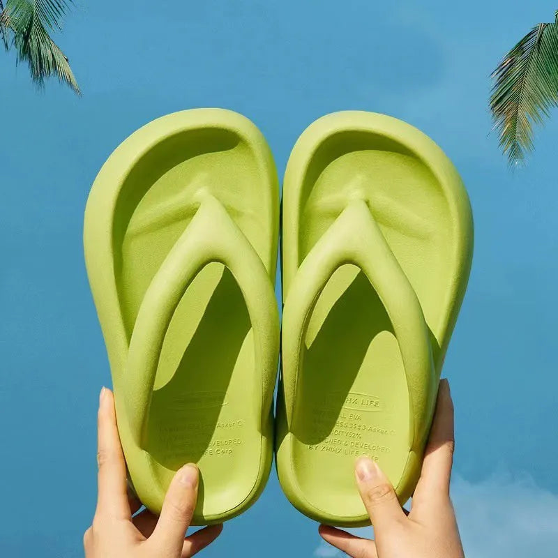 Solid colour thick-soled EVA flip-flops with a bow detail, shown in multiple colours.