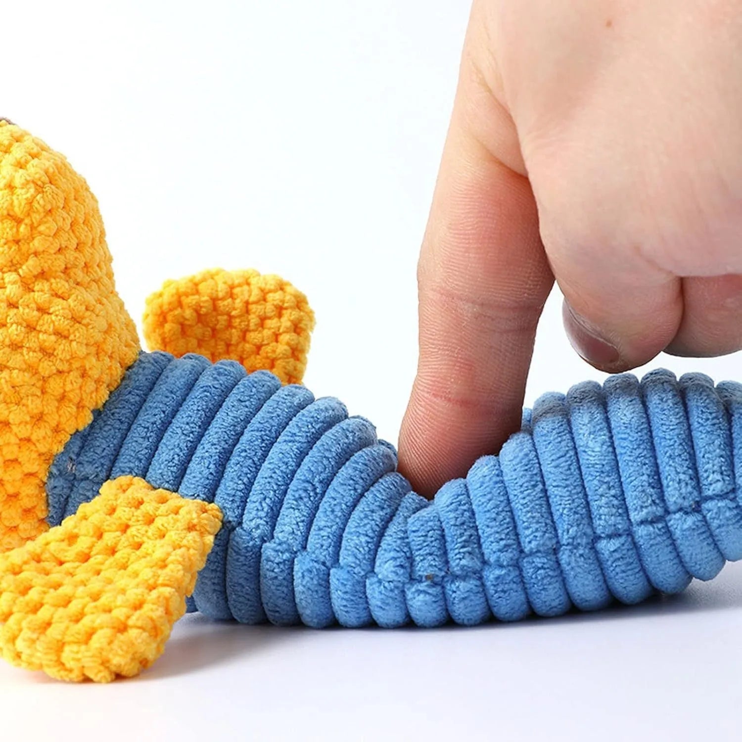 Squeaky stuffed animal dog chew toy in polyester fibre for dental care and chewing relief