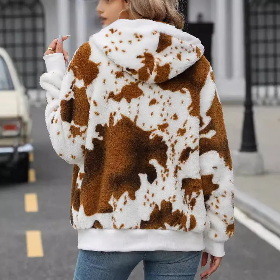 Yellow brown cow print women's hooded cardigan jacket with a full front zipper.