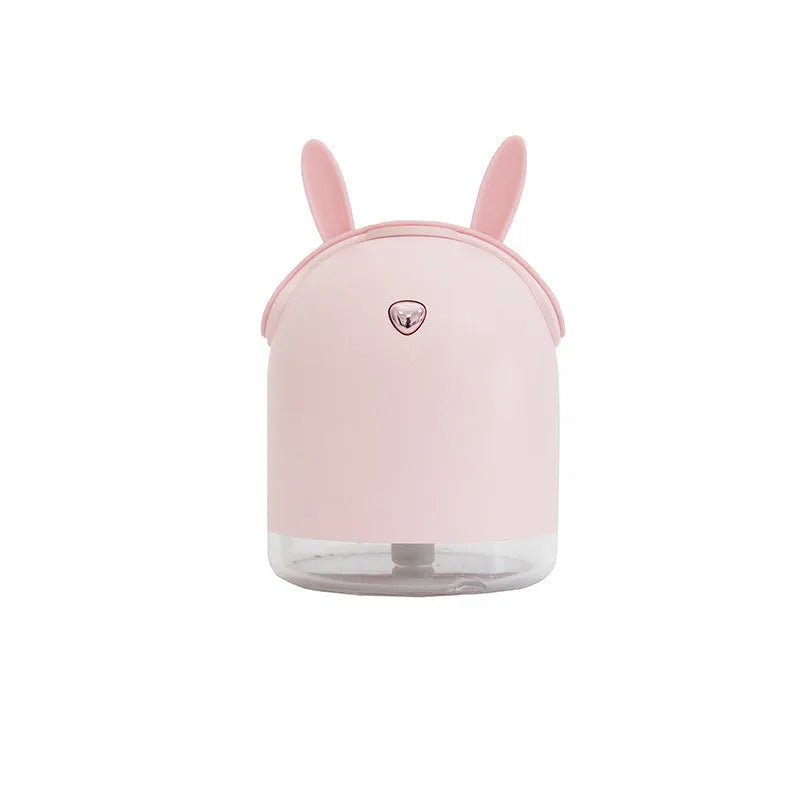 USB ultrasonic micron atomisation humidifier in pink, compact size, with single fog outlet and built-in light