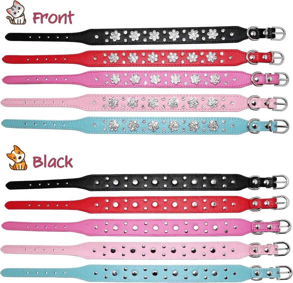 Close-up of a black PU leather dog collar with a sparkling rhinestone flower pattern and silver studs.