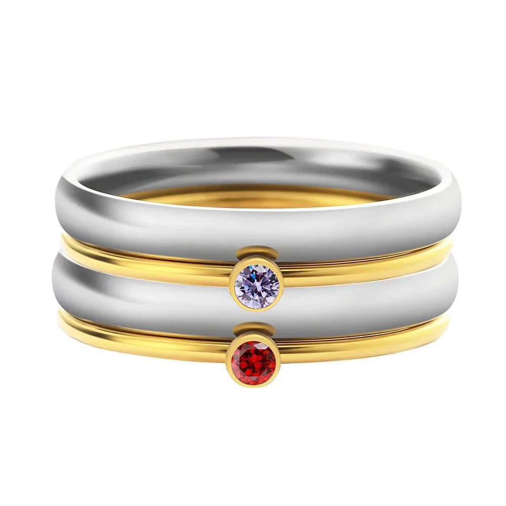 December birthstone engraved titanium steel ring with geometric superimposed design.