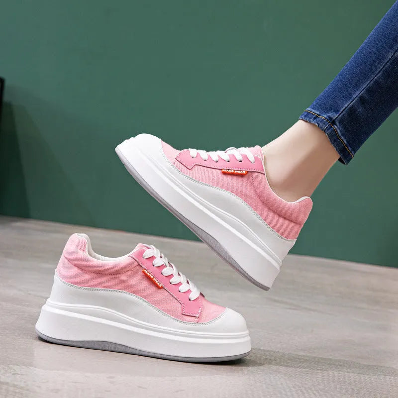 Women's beige leather board shoes with thick soles for height increase on neutral background
