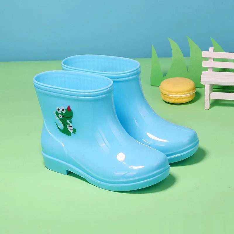 Children's non-slip plastic rain boots in solid colour with mid-calf height, available in multiple sizes