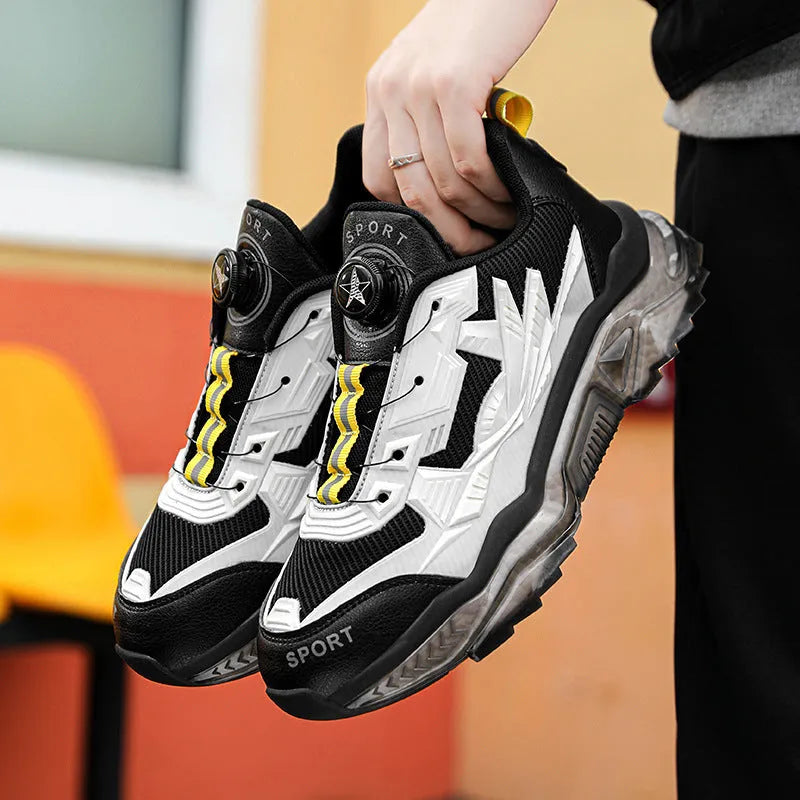 Men's black rotating button dad shoes with mesh upper and platform sole on a white background