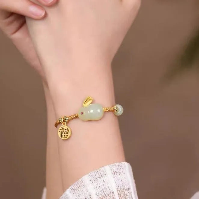 Women's rabbit bracelet with Hetian jade geometric charm on yellow string