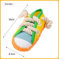 Colourful plastic dog chew toy with bends and squeaker for dental exercise