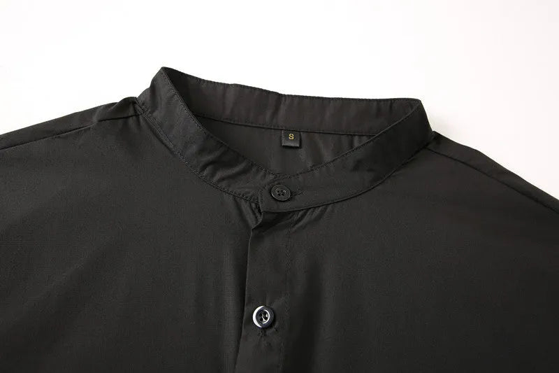 Teenage men's black stand-up collar shirt with fitted silhouette, shown front view, plain background.