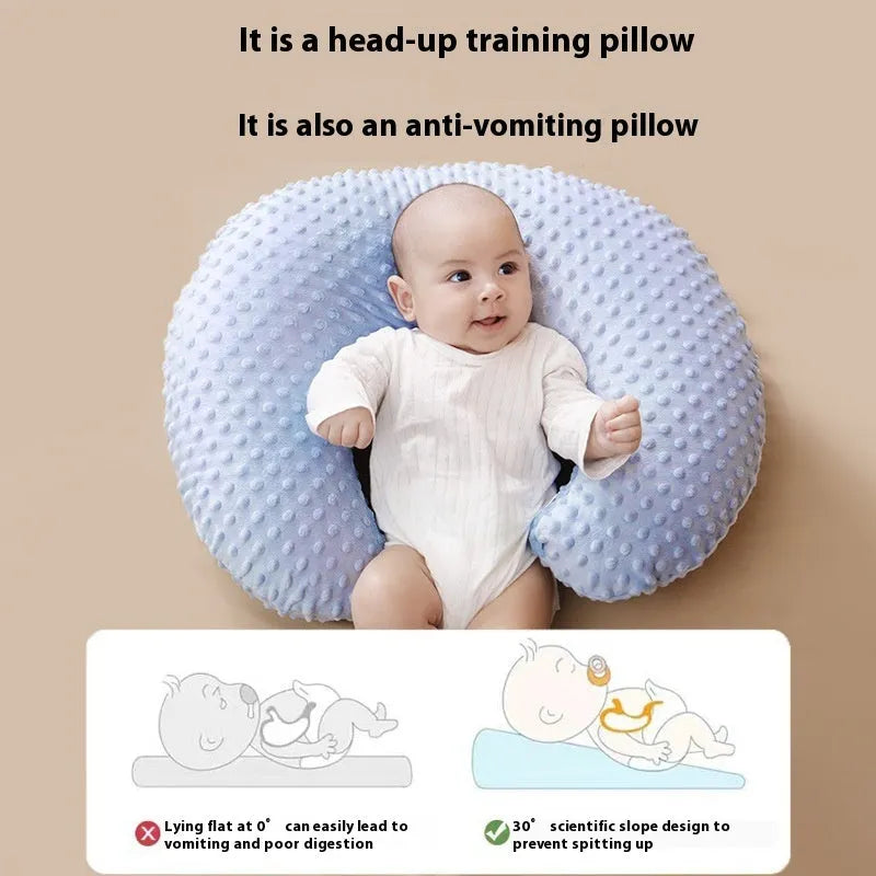 M shaped nursing pillow with removable pillowcase for breastfeeding support and spill prevention