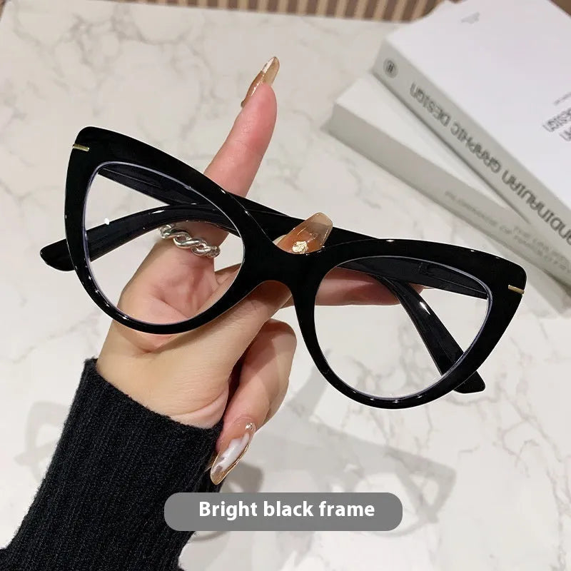 Women's cat eye reading glasses with large frames showing dragon and phoenix decorations