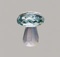 Colourful acrylic mushroom crystal decoration in geometric style, measuring 40mm by 53mm.
