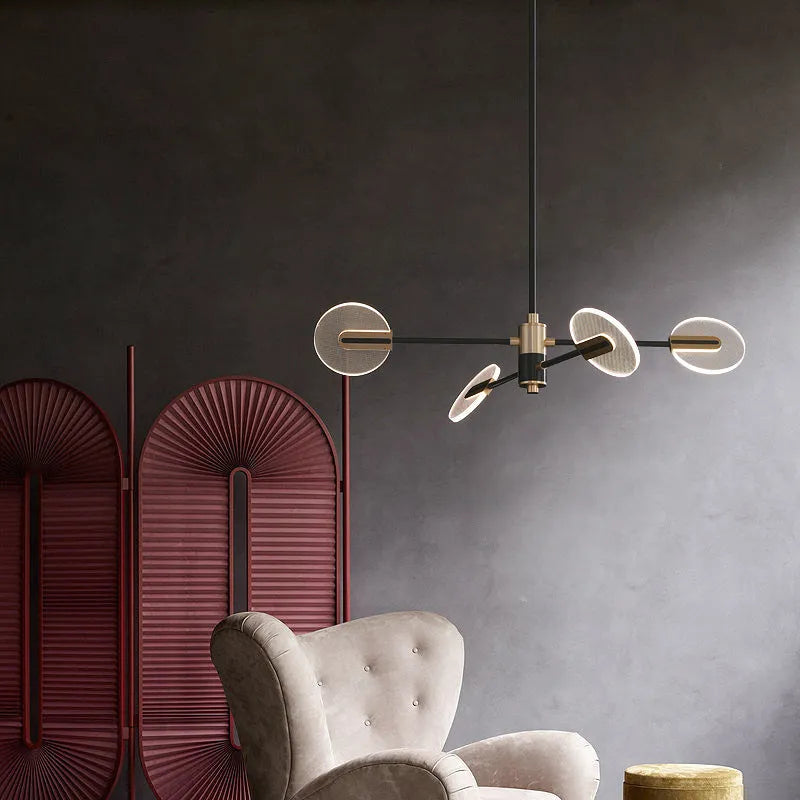 Nordic style iron frame LED chandelier with multiple acrylic lamp shades suspended.