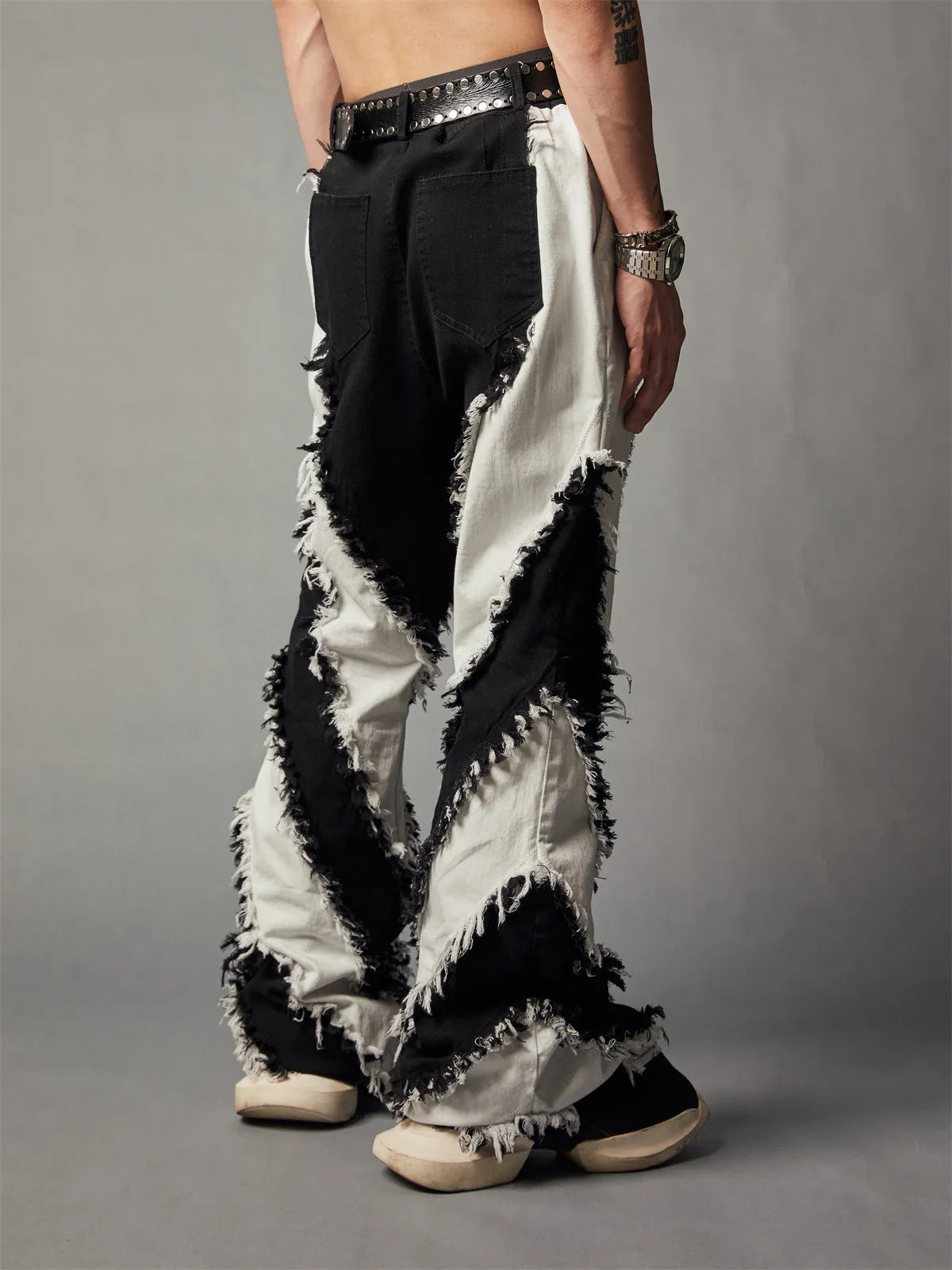 Black white patchwork slim fit rough edge washed jeans with mid waist and zip fly