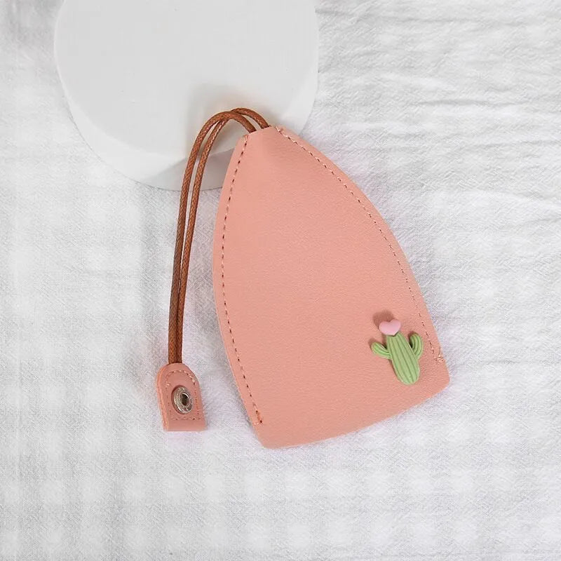 Cartoon design pull-out key case for car keys in PU leather.