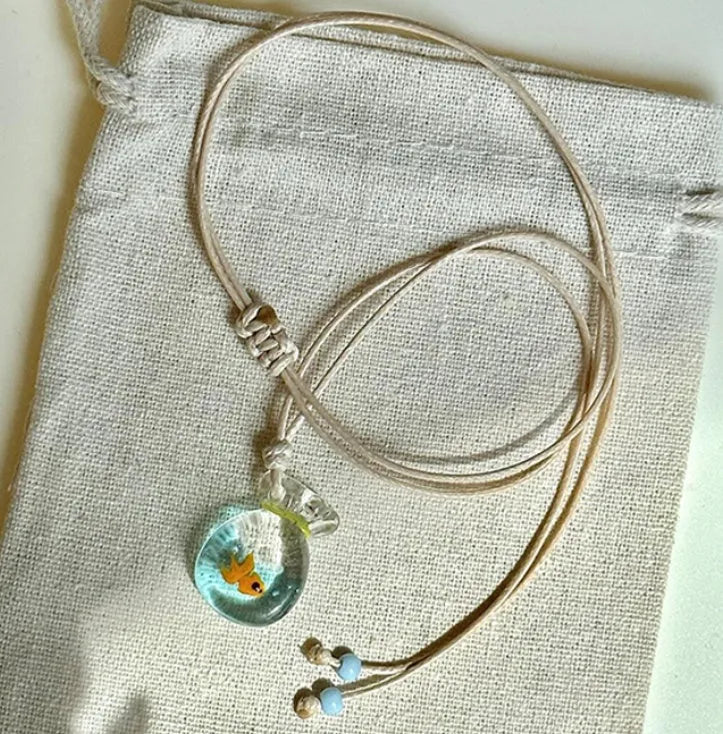 Women's skirt and joker pendant necklace with coloured glaze on cotton linen chain