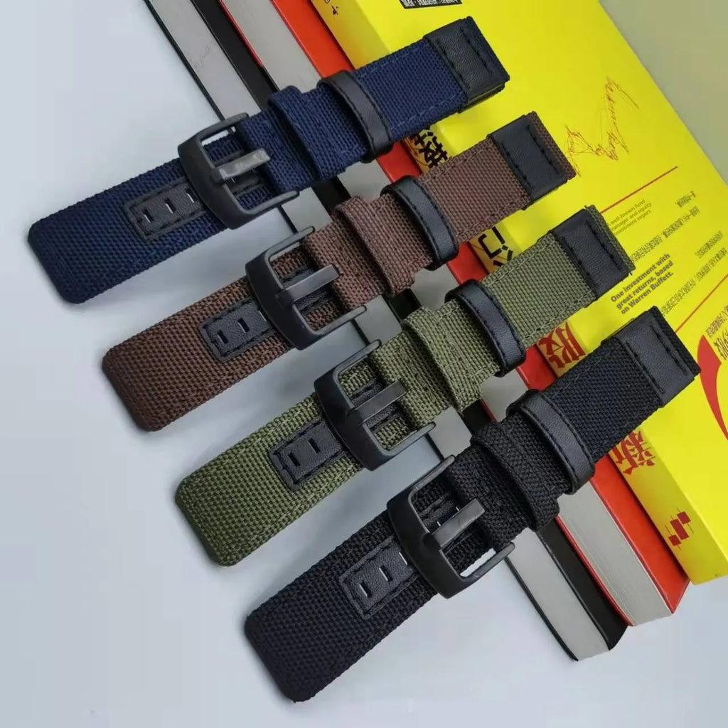 Oxford cloth watch strap in army green showing textured fabric and standard watch lug attachment