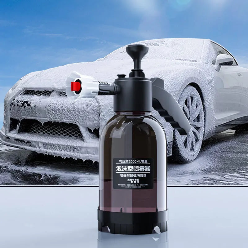 Black hand-held foam sprayer with 2L capacity, ergonomic handle, and switch lock for gardening and car washing.