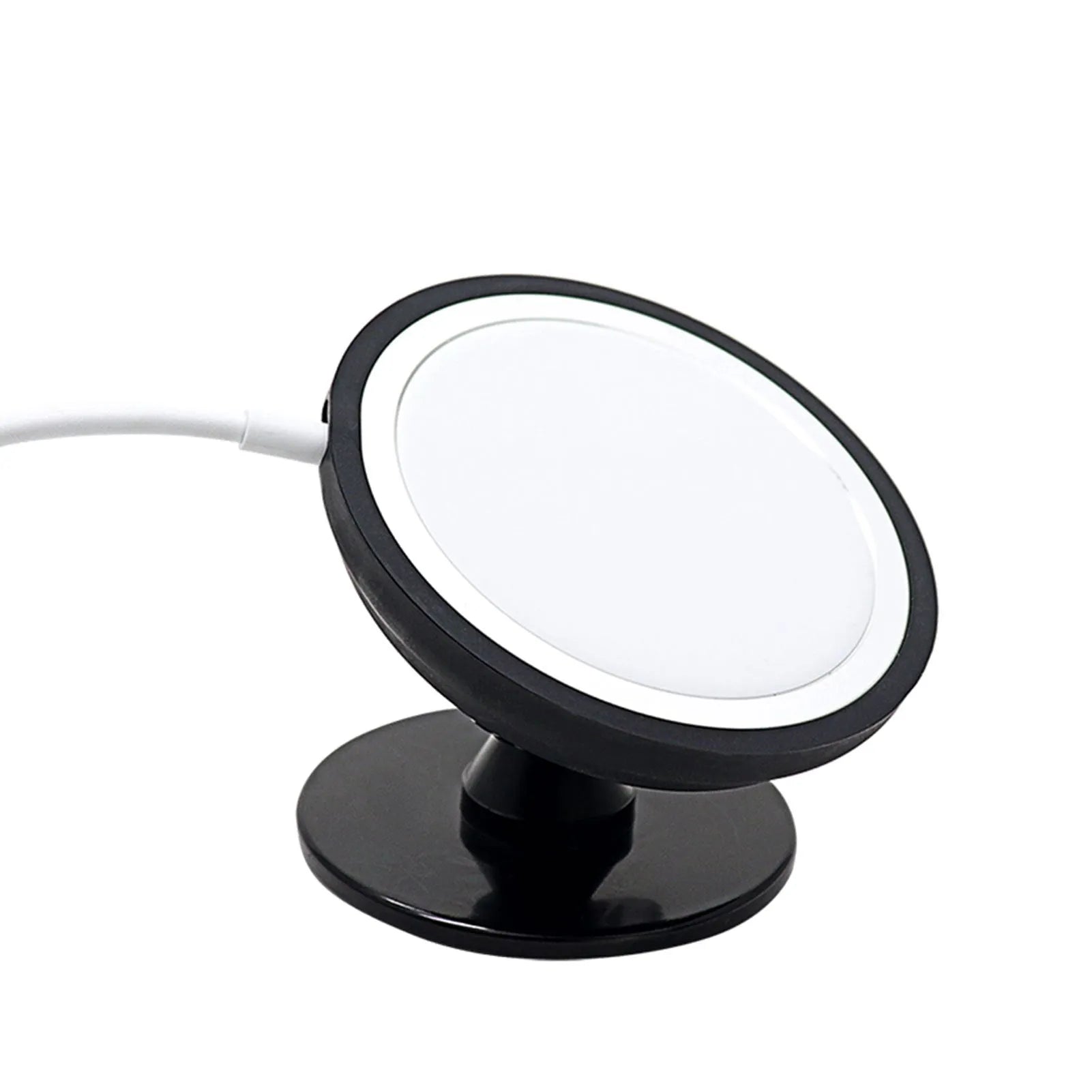 Black car magnetic mobile phone holder mounted on vehicle dashboard