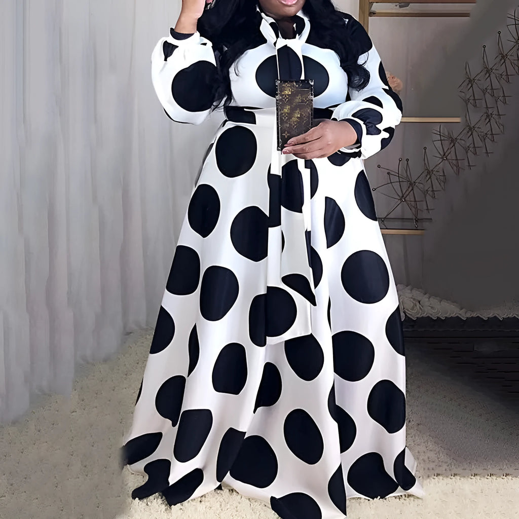Women's large size white polka dot dress with long sleeves and long skirt, shown in white with white dots
