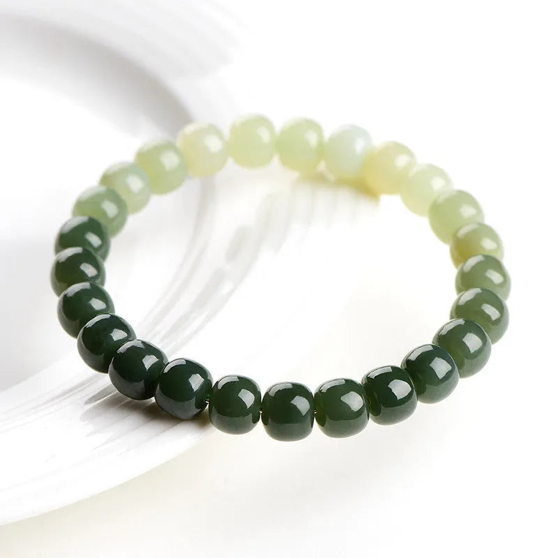 Natural Hetian jade water gradient bracelet with polished beads in clear tones