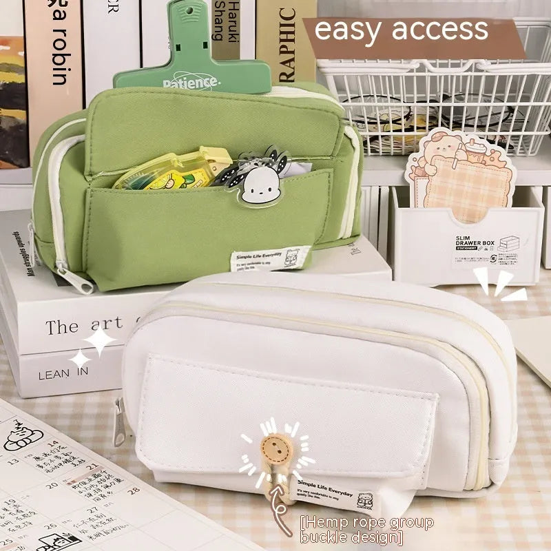 Green Korean-style canvas pencil case open, showing large capacity for pens and stationery.