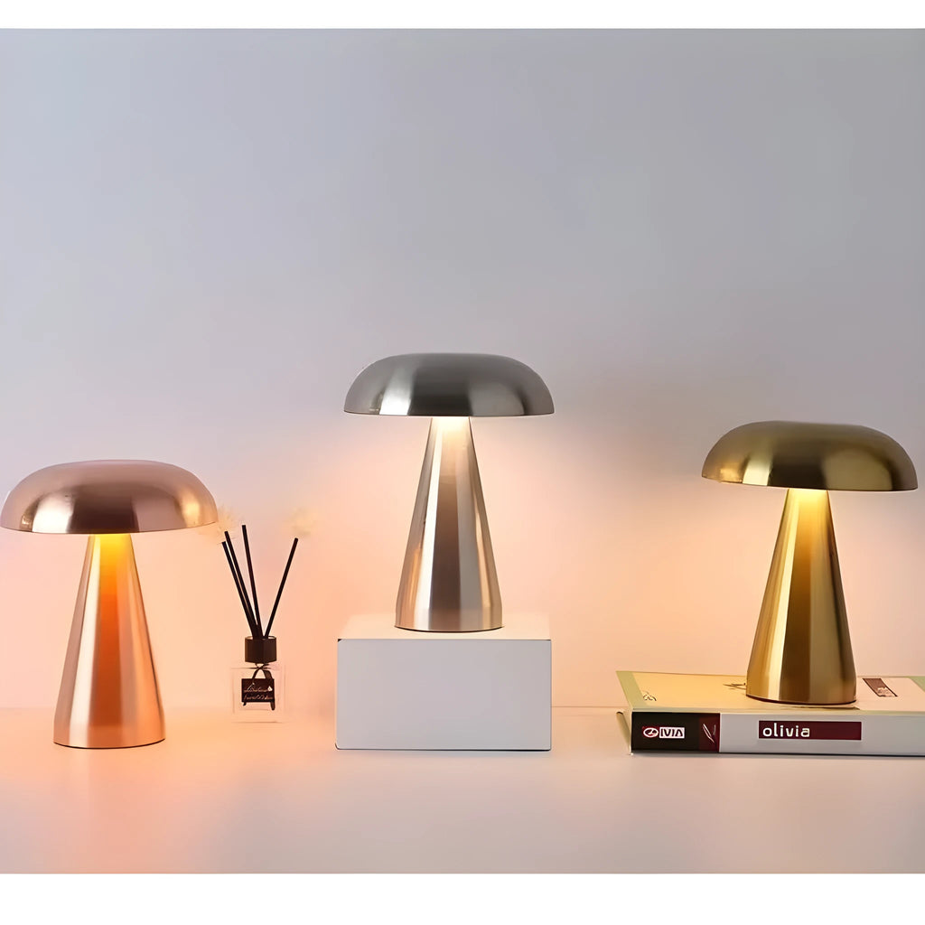 Mushroom-shaped ambient light in gold finish with European-style details on a bedside table