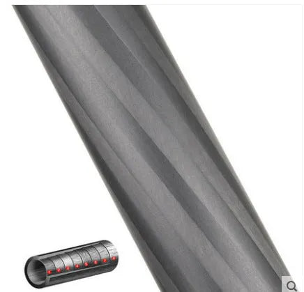 Black carbon fibre monopod for DSLR cameras extended to maximum height