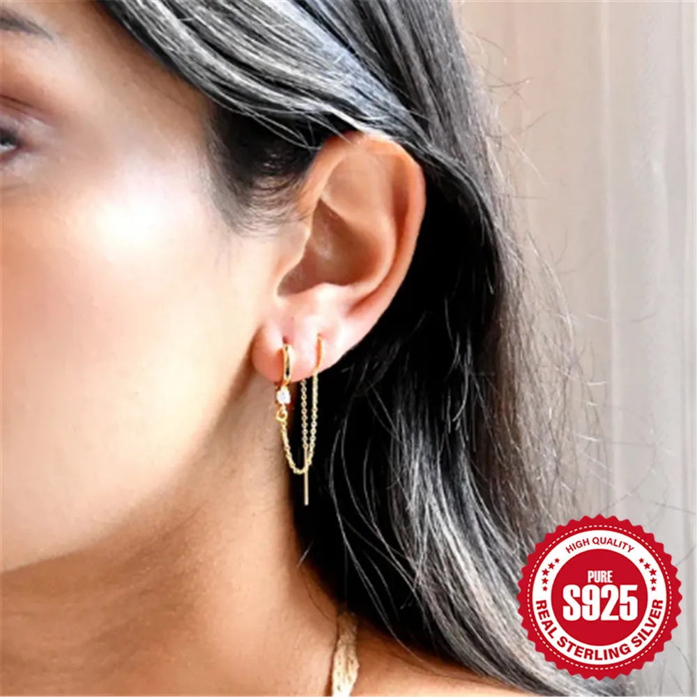 S925 sterling silver ear studs with a diamond flower, tassel, and chain design in a golden electroplated finish.
