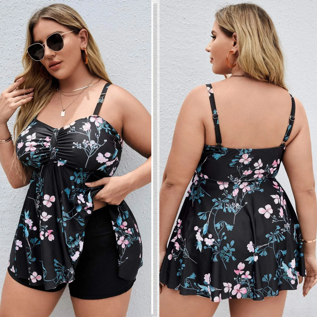 Women's floral print one-piece swimsuit on a hanger, showing split colour pattern.