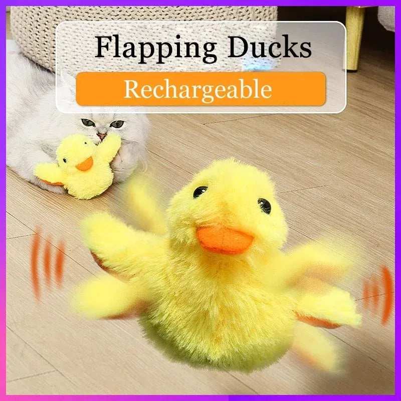 Yellow polyester plush duck cat toy with electric flapping wings on green background