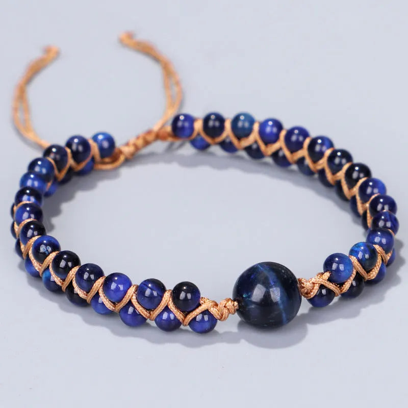 Handmade woven geometric pull bracelet with blue tigereye stone beads.