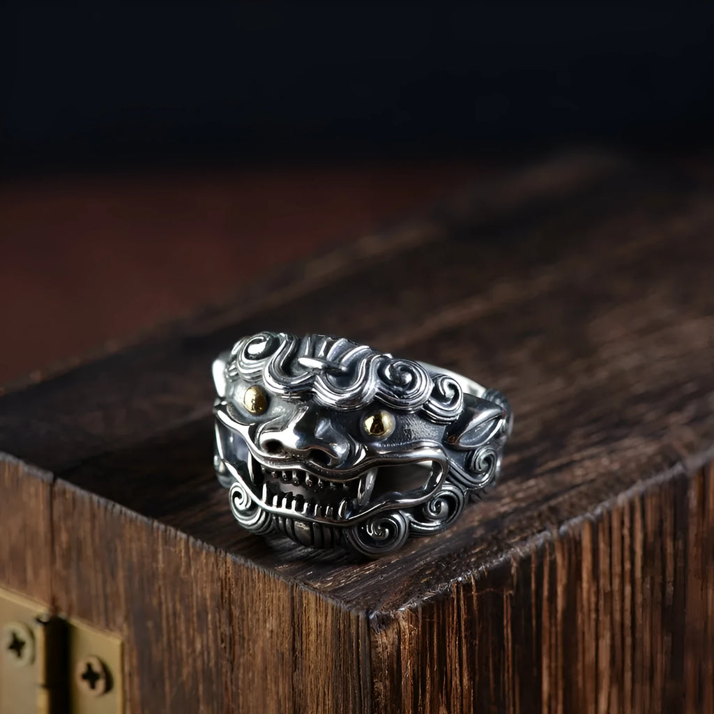 Silver open ring with detailed jibeast animal zodiac pattern showing adjustable retro design