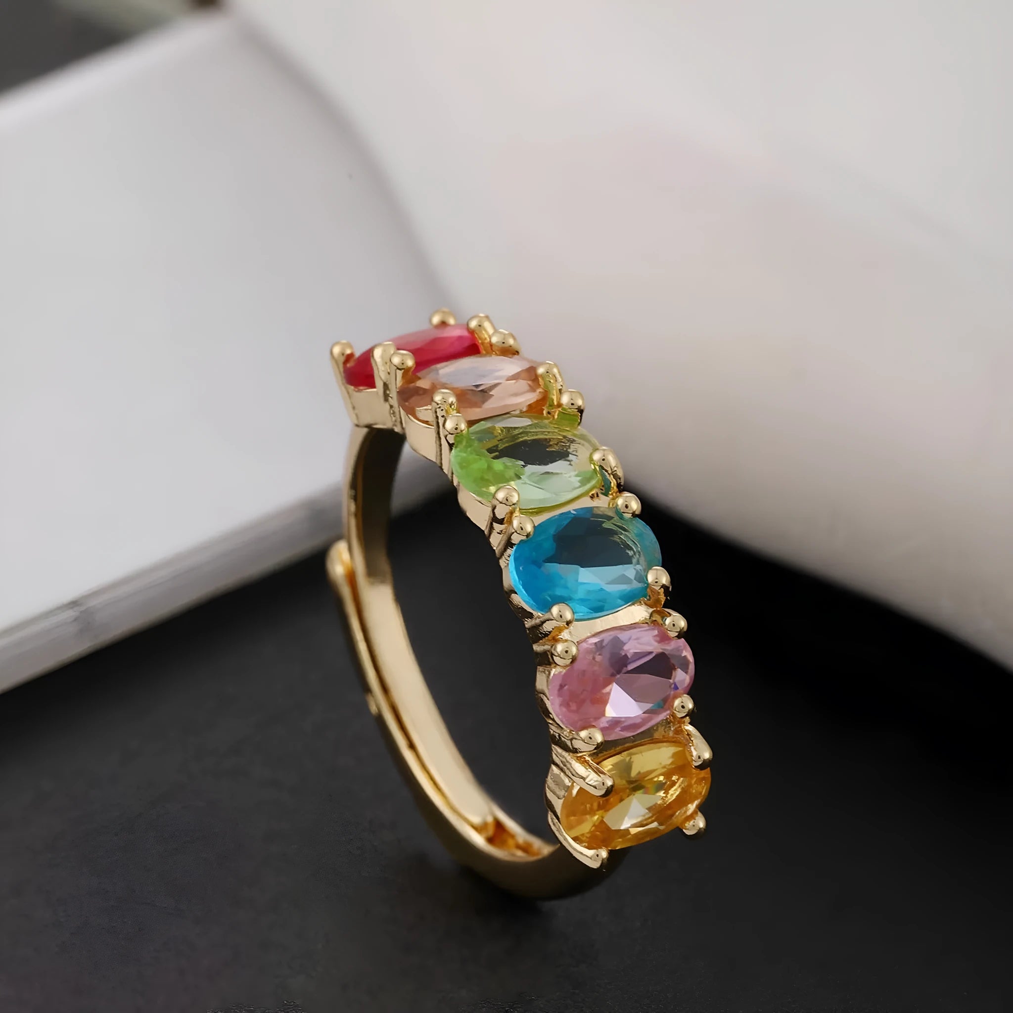 Women's gold-colour adjustable ring with zircon stones on a simple retro-style band.