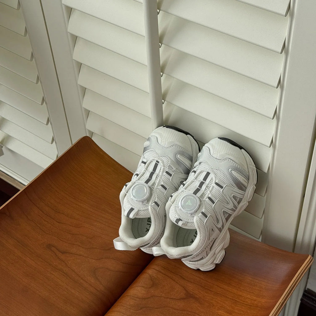 Lightweight beige casual shoes with a breathable PU leather mesh upper for girls and women.