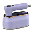 Light purple foldable portable travel iron with a ceramic soleplate and UK plug on a white background.