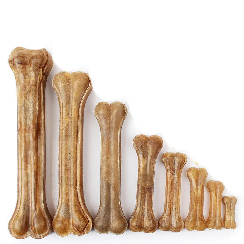 Buffalo leather dog chew stick laid flat, showing natural hide texture and bone-like shape