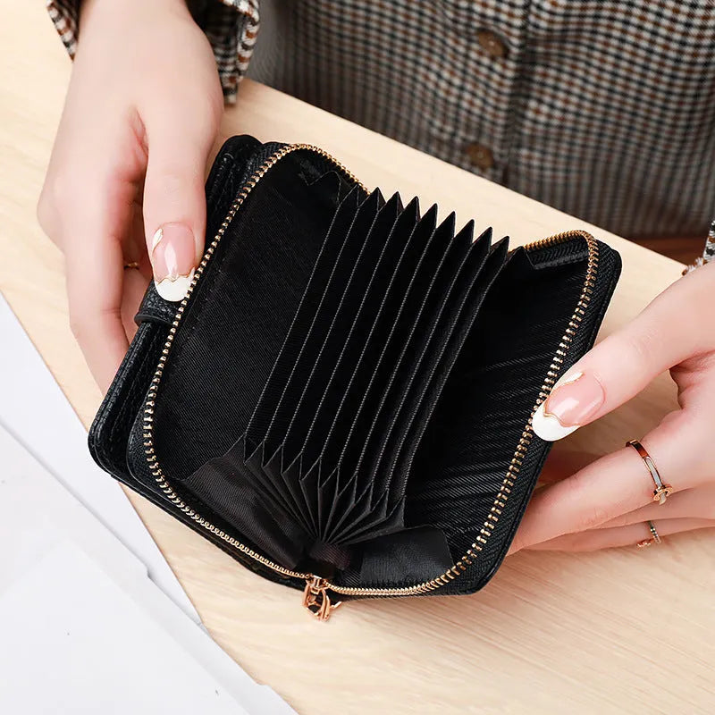 Ladies' short PU leather wallet with a lychee pattern, shown folded, in beige, pink, black, and red colour options.