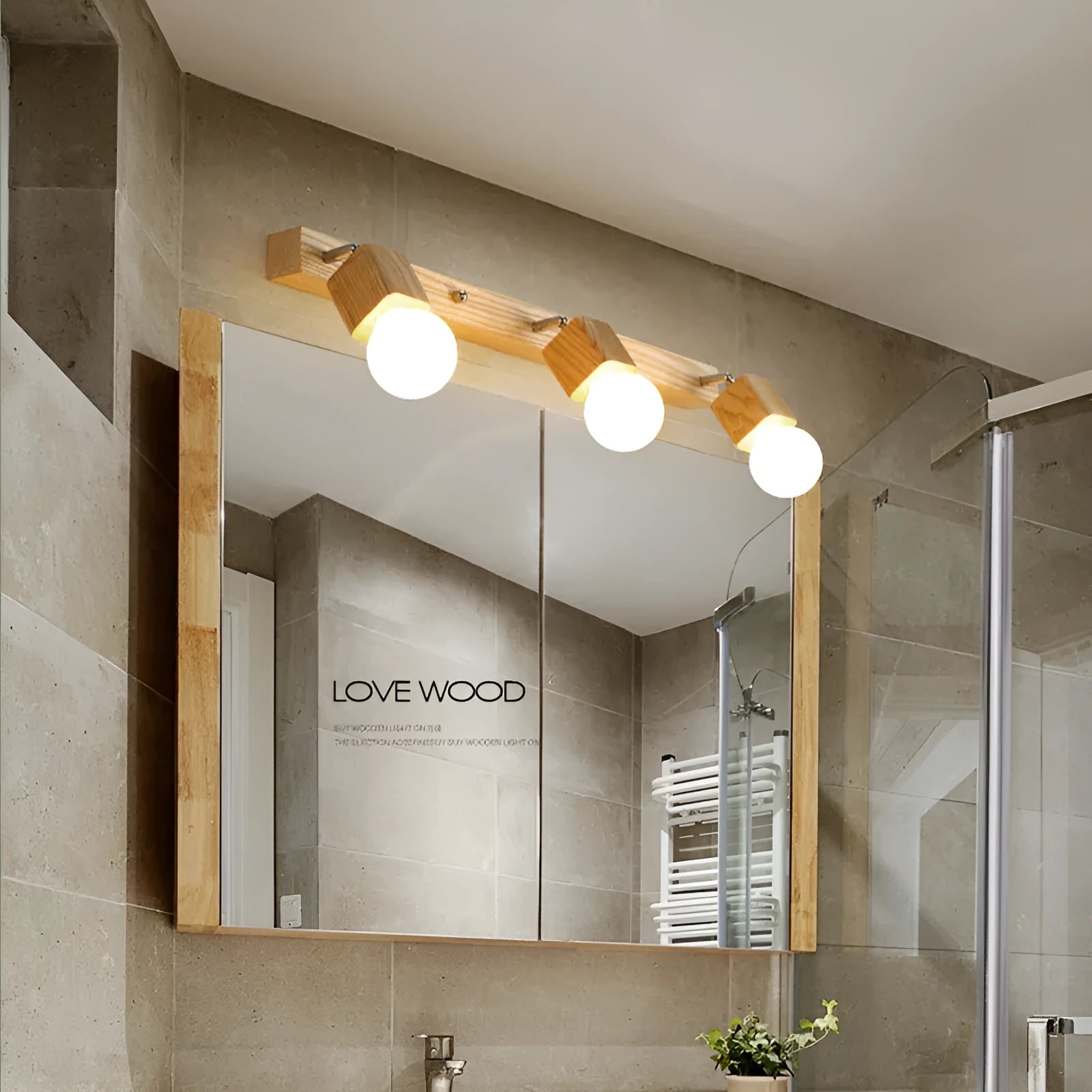 Single-head LED wall lamp with a 24cm size for mirror cabinets
