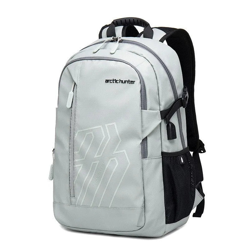 Casual blue plaid polyester 18-inch computer backpack with curved shoulder straps laid flat.
