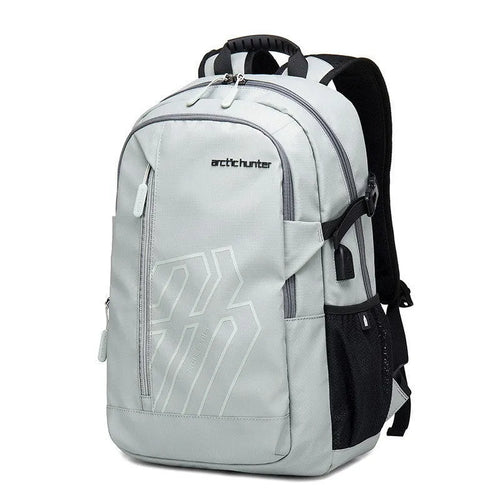 Casual blue plaid polyester 18-inch computer backpack with curved shoulder straps laid flat.
