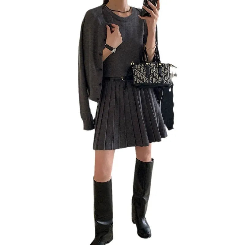 Women's black knitted vest skirt and cardigan two-piece set with 3D pattern and adjustable belt