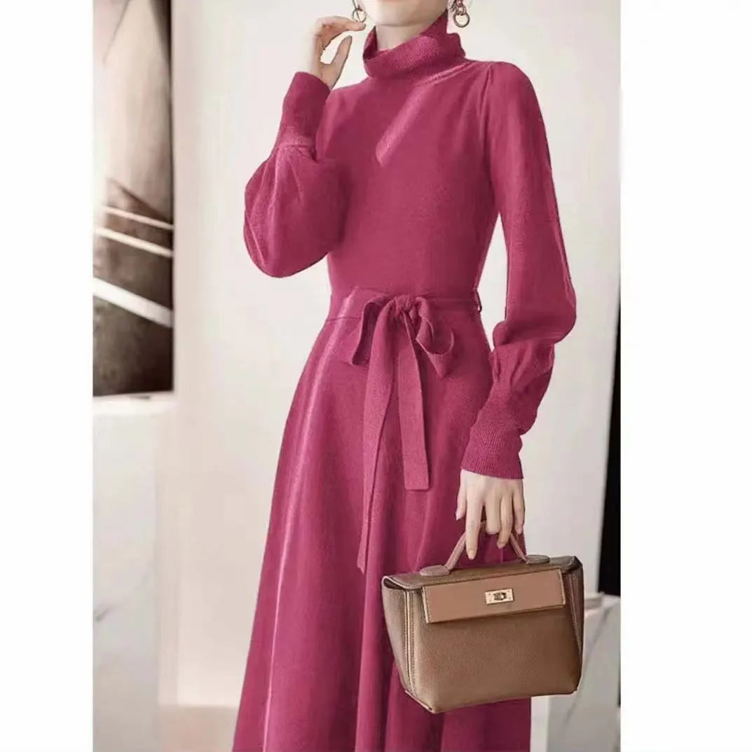 Women's solid color turtleneck knit dress with long sleeves and elastic waist in rose red, black, red, or blue