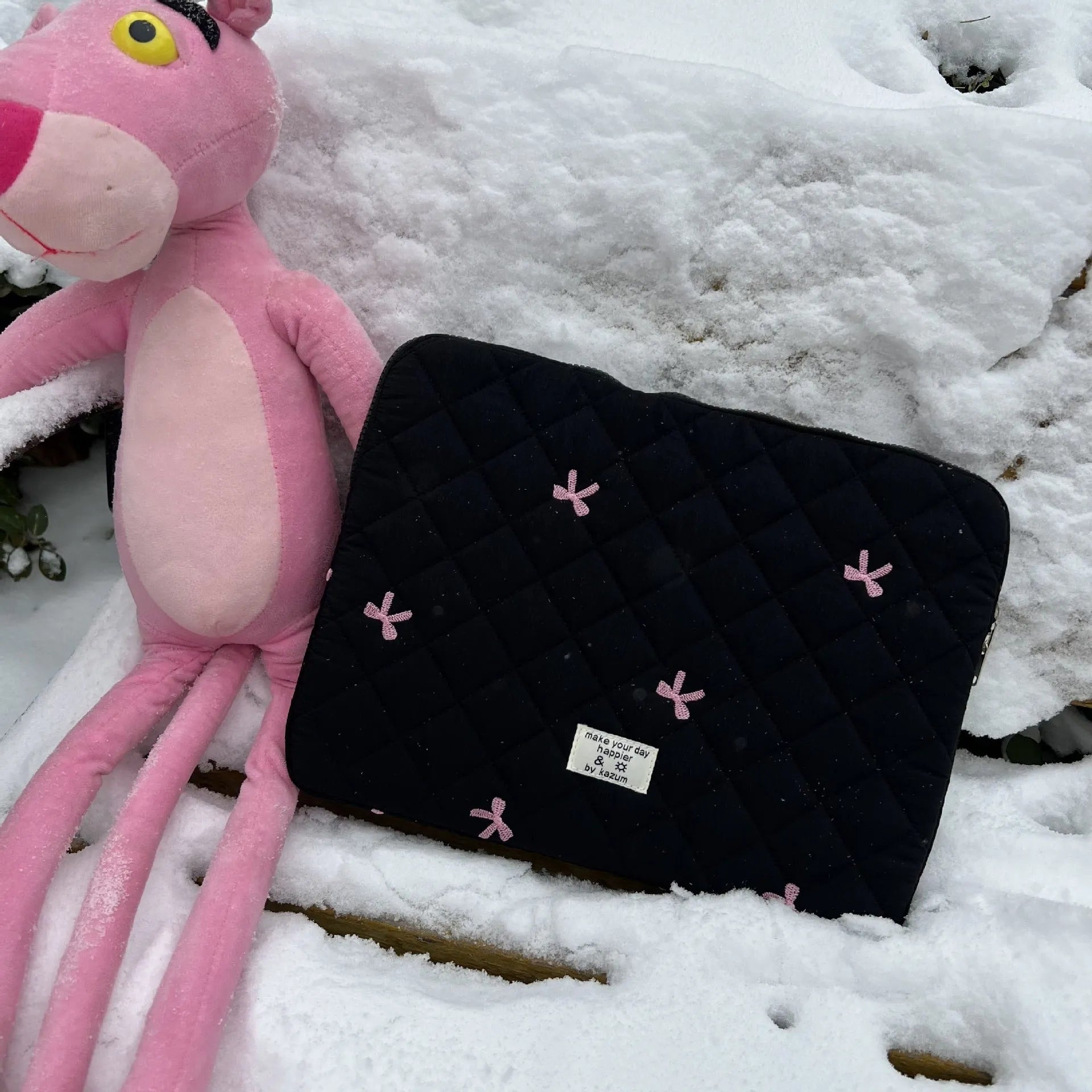 Rhombus embroidered bow design on nylon laptop storage bag showing colour and size options