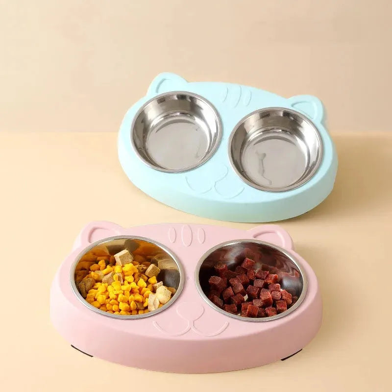 Blue macaron-shaped plastic pet feeder with two bowls for cat food and water